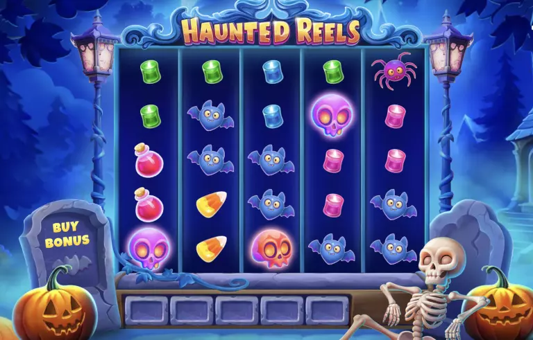 Haunted Reels slot game with Halloween-themed symbols like skulls, bats, candy corn, and potions on a spooky graveyard background
