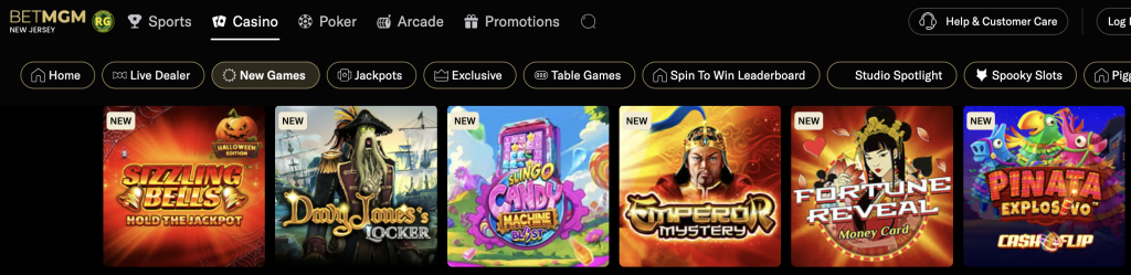 BetMGM Casino New Games section featuring Sizzling Bells Halloween Edition, Davy Jonesâs Locker, Slingo Candy Machine Blast, Emperor Mystery, Fortune Reveal Money Card, and Piñata Explosivo Cash Flip slot titles.