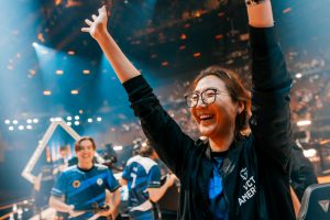 Christine "potter" Chi of Evil Geniuses celebrates on stage at VALORANT Champions 2023