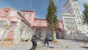 Two CT players leaving the spawn area on Inferno map in Counter-Strike 2.