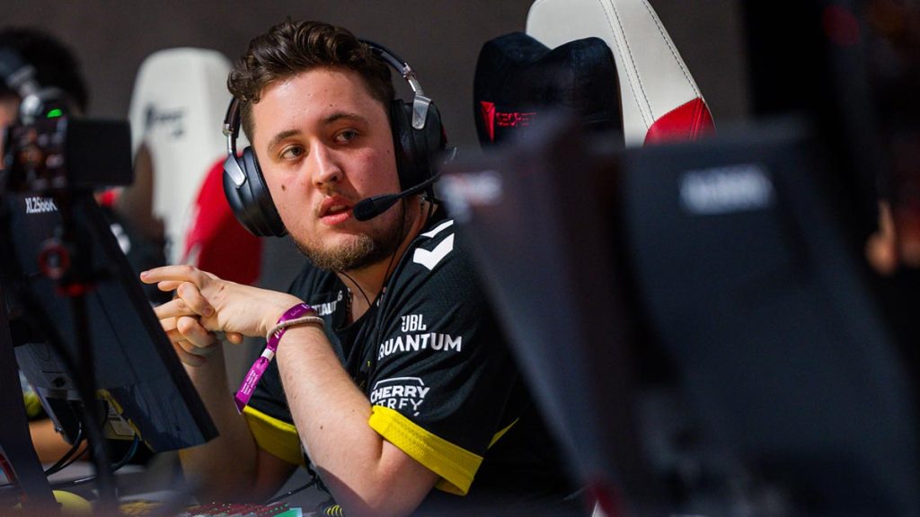 Mathieu "ZywOo" Herbaut looking at Team Vitality teammates on stage at PGL Copenhagen Major.