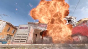 An explosion at the bomb site on Inferno in Counter-Strike.