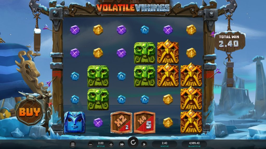Volatile Vikings slot displaying colorful Norse rune stones and fierce Viking totems against an icy backdrop of ships and snow.