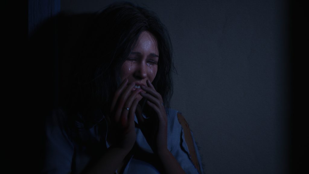 A survivor in Halloween: The Game crying