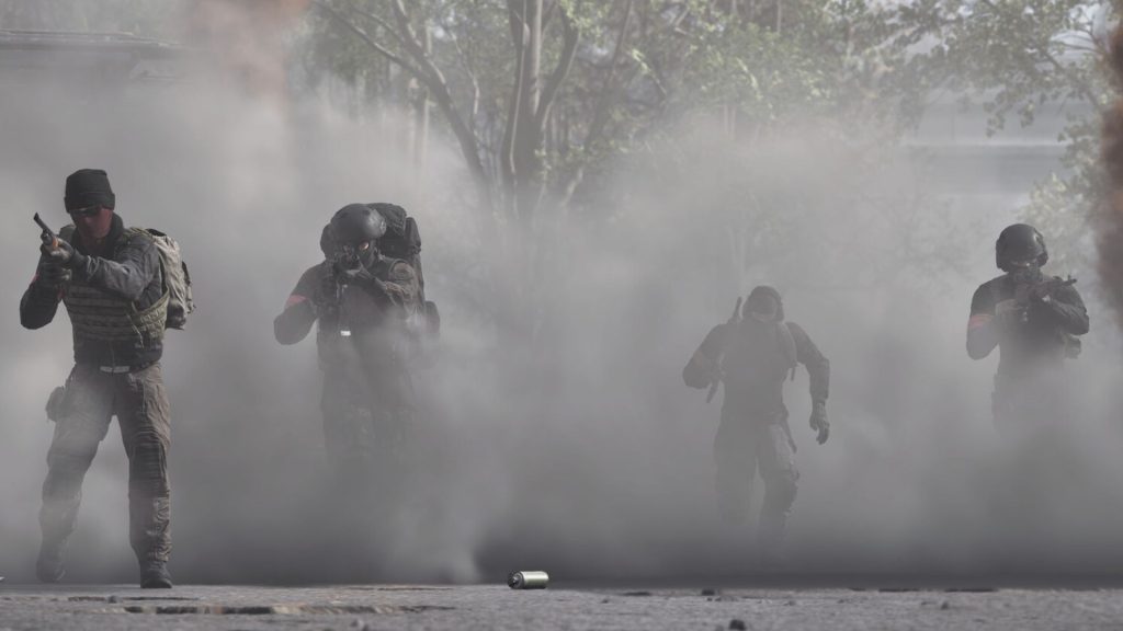 soldiers running through smoke in wardogs