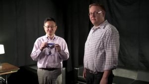 Shuhei Yoshida and Adam Boyes in sony playstation disc game swap advert